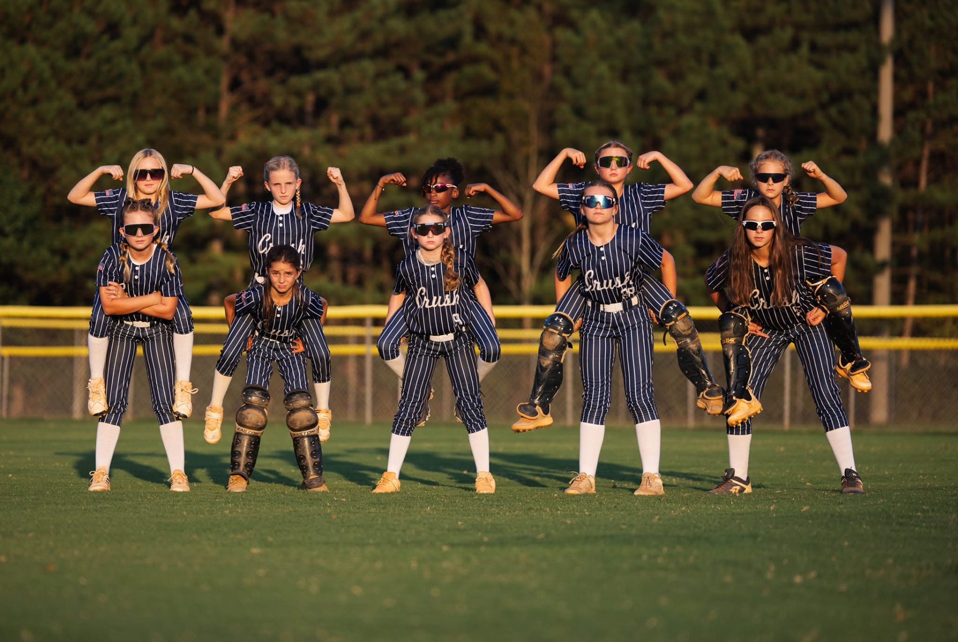 Players giving piggyback rides and posing with sunglasses